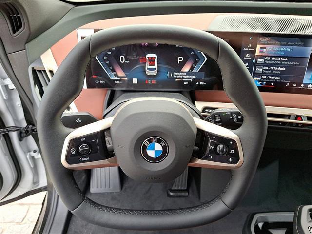 new 2026 BMW iX car, priced at $99,725