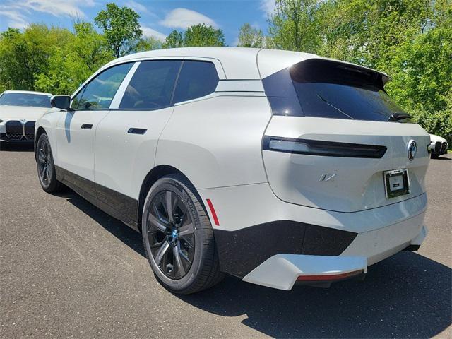 new 2025 BMW iX car, priced at $97,570