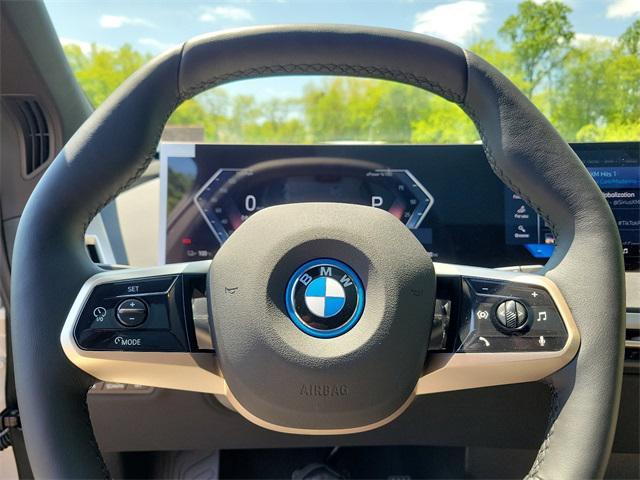 new 2025 BMW iX car, priced at $97,570