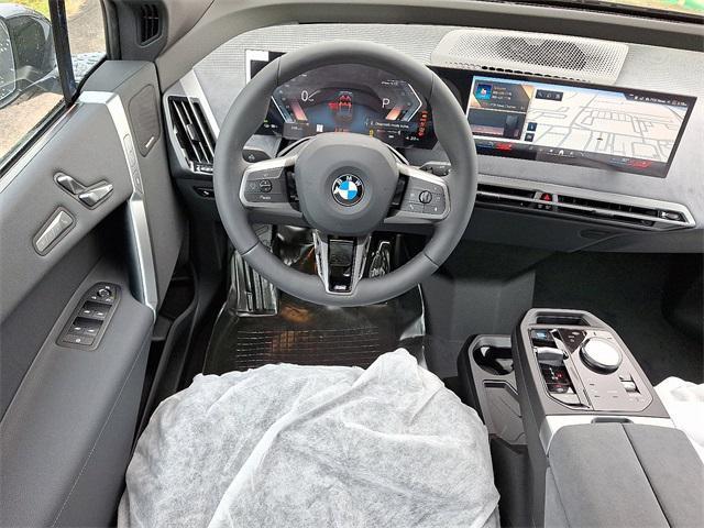 new 2026 BMW iX car, priced at $91,375