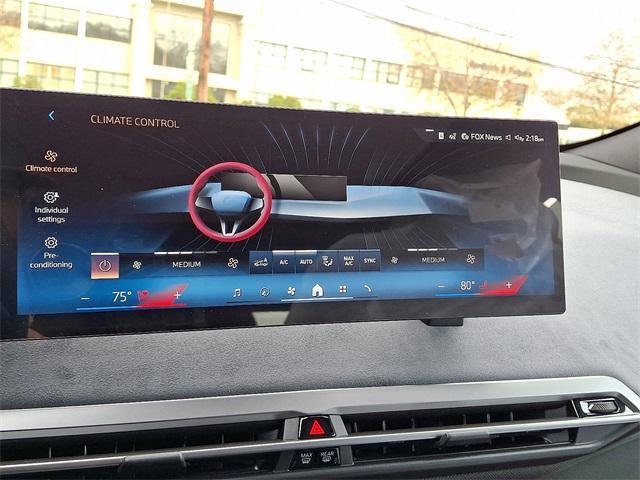 new 2026 BMW iX car, priced at $91,375