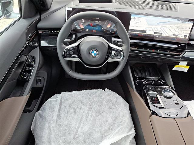 new 2026 BMW 530 car, priced at $70,140