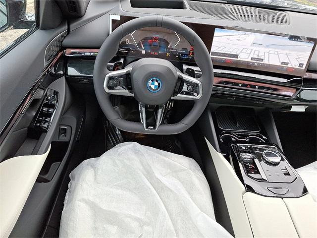 new 2026 BMW 550e car, priced at $87,640