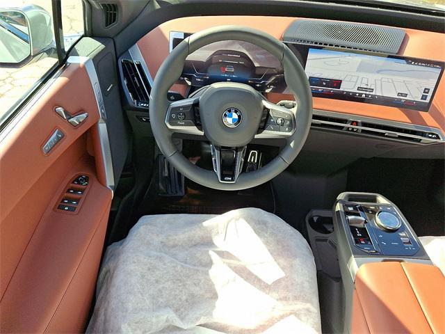new 2026 BMW iX car, priced at $95,320