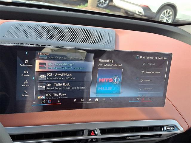 new 2026 BMW iX car, priced at $95,320