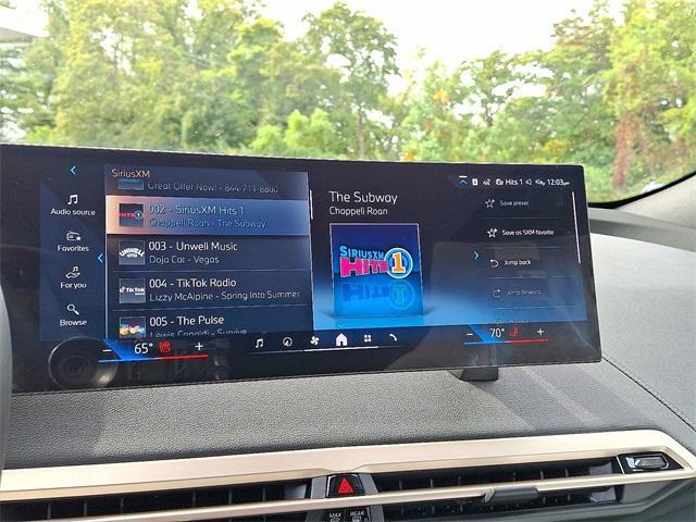 new 2026 BMW iX car, priced at $82,020