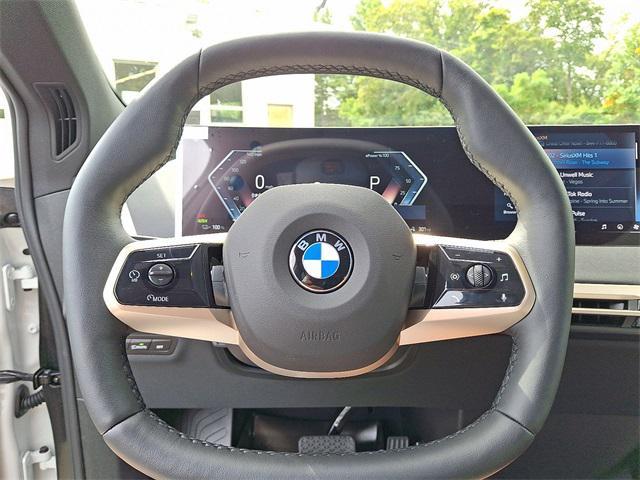 new 2026 BMW iX car, priced at $82,020