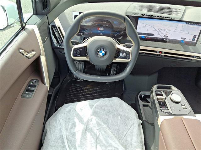new 2026 BMW iX car, priced at $82,020