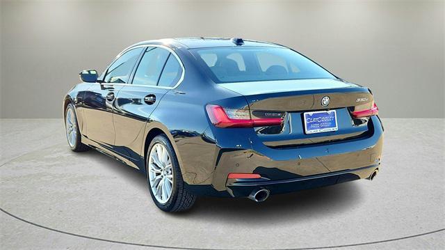 used 2024 BMW 330e car, priced at $31,626