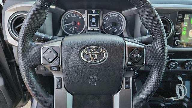 used 2023 Toyota Tacoma car, priced at $27,623