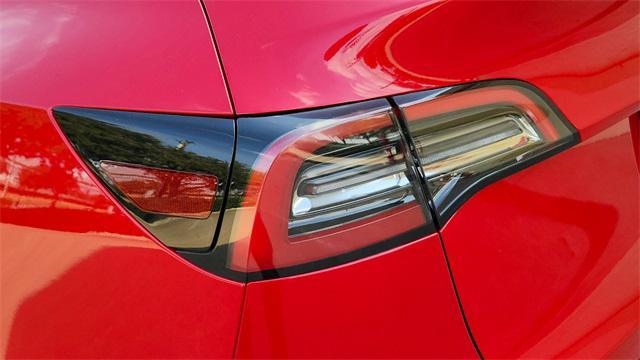 used 2023 Tesla Model Y car, priced at $30,144