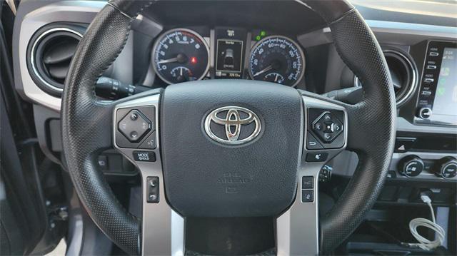 used 2023 Toyota Tacoma car, priced at $27,623