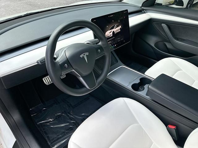 used 2022 Tesla Model 3 car, priced at $27,623