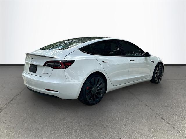 used 2022 Tesla Model 3 car, priced at $27,623