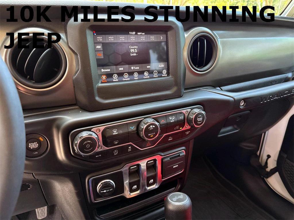used 2023 Jeep Wrangler car, priced at $28,671