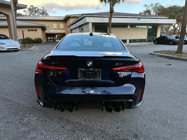 used 2025 BMW M4 car, priced at $91,991