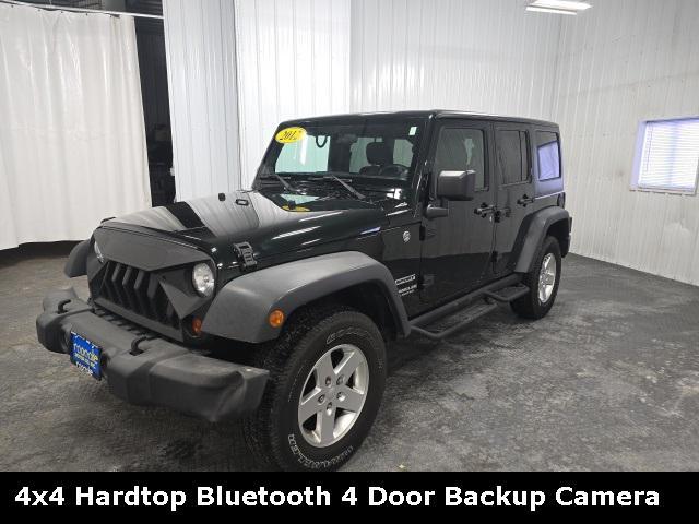 used 2012 Jeep Wrangler Unlimited car, priced at $14,000