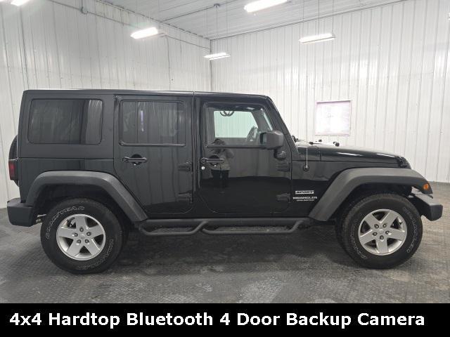 used 2012 Jeep Wrangler Unlimited car, priced at $14,000