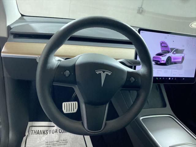 used 2024 Tesla Model Y car, priced at $39,995