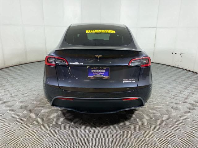 used 2024 Tesla Model Y car, priced at $39,995