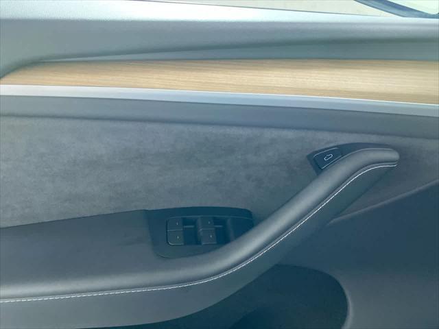 used 2024 Tesla Model Y car, priced at $39,995