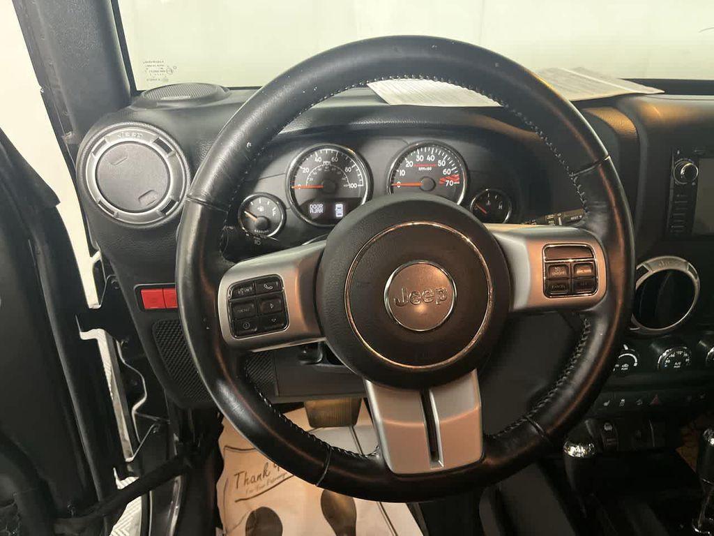 used 2017 Jeep Wrangler Unlimited car, priced at $22,936