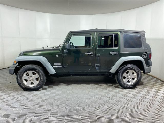 used 2011 Jeep Wrangler Unlimited car, priced at $11,995