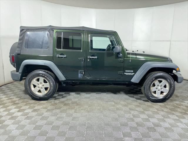 used 2011 Jeep Wrangler Unlimited car, priced at $11,995