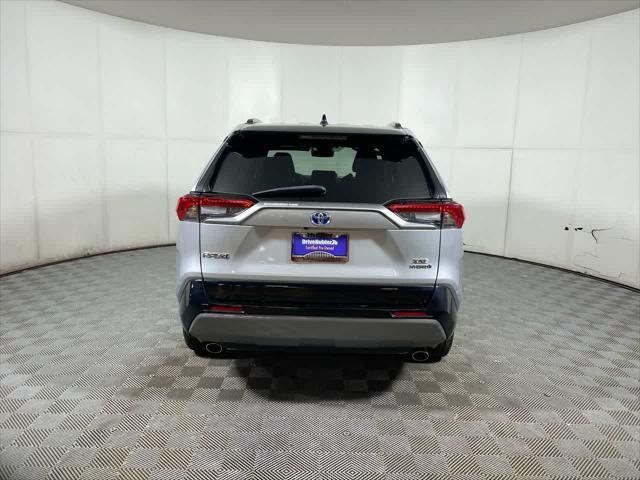 used 2021 Toyota RAV4 Hybrid car, priced at $30,495