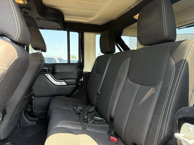 used 2015 Jeep Wrangler Unlimited car, priced at $12,990