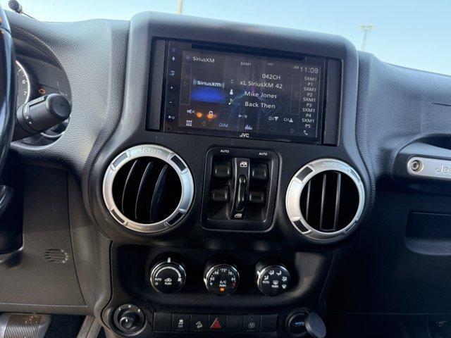 used 2015 Jeep Wrangler Unlimited car, priced at $12,990