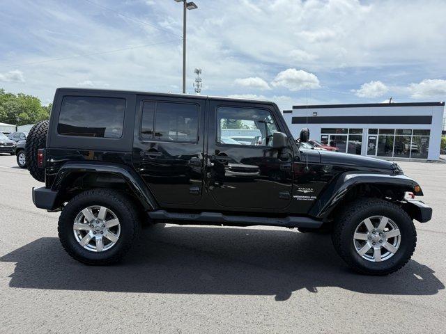 used 2012 Jeep Wrangler Unlimited car, priced at $16,990