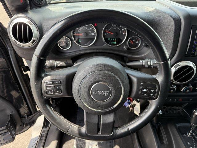 used 2012 Jeep Wrangler Unlimited car, priced at $16,990