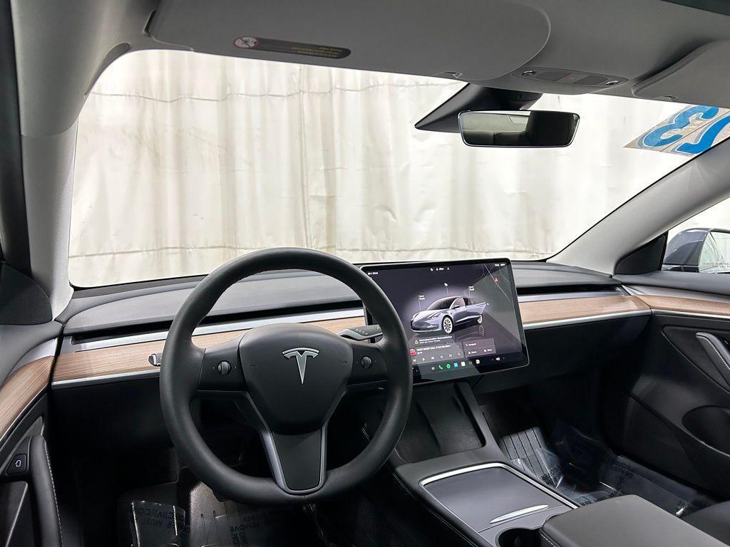 used 2023 Tesla Model 3 car, priced at $30,996