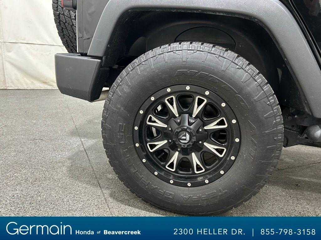 used 2015 Jeep Wrangler Unlimited car, priced at $23,973