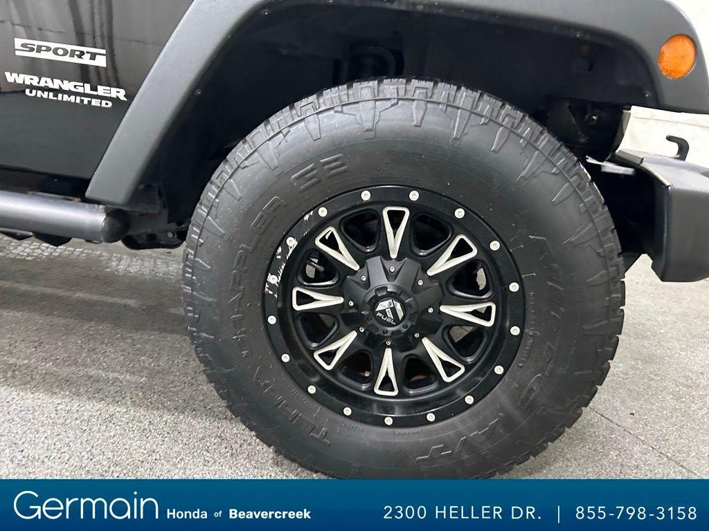 used 2015 Jeep Wrangler Unlimited car, priced at $23,973