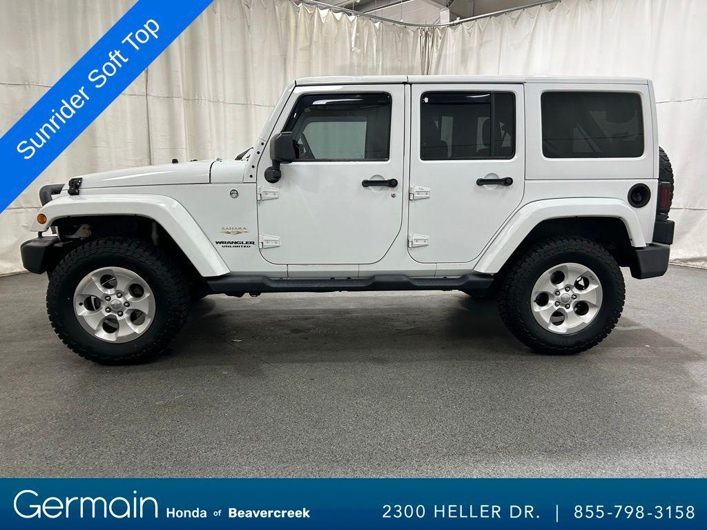 used 2014 Jeep Wrangler Unlimited car, priced at $14,987