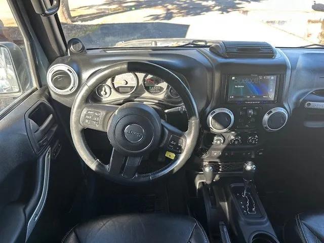 used 2014 Jeep Wrangler Unlimited car, priced at $21,900