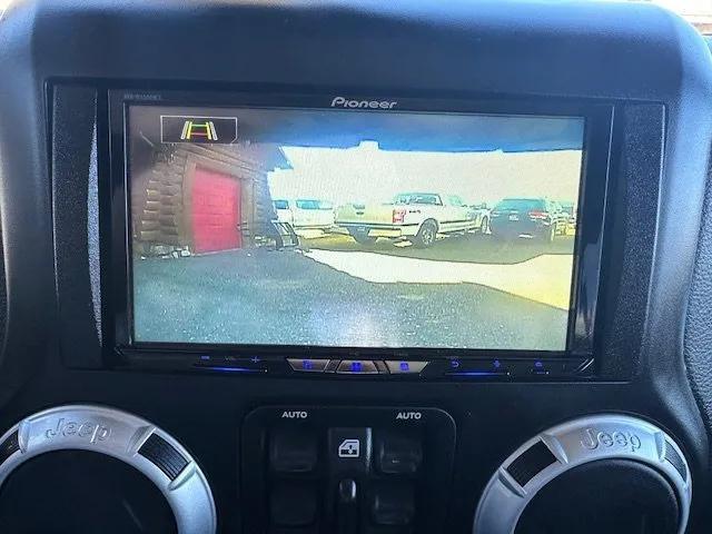 used 2014 Jeep Wrangler Unlimited car, priced at $21,900