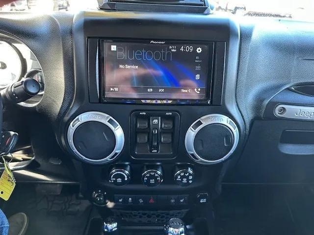 used 2014 Jeep Wrangler Unlimited car, priced at $21,900