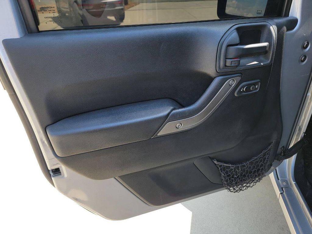 used 2015 Jeep Wrangler Unlimited car, priced at $18,269