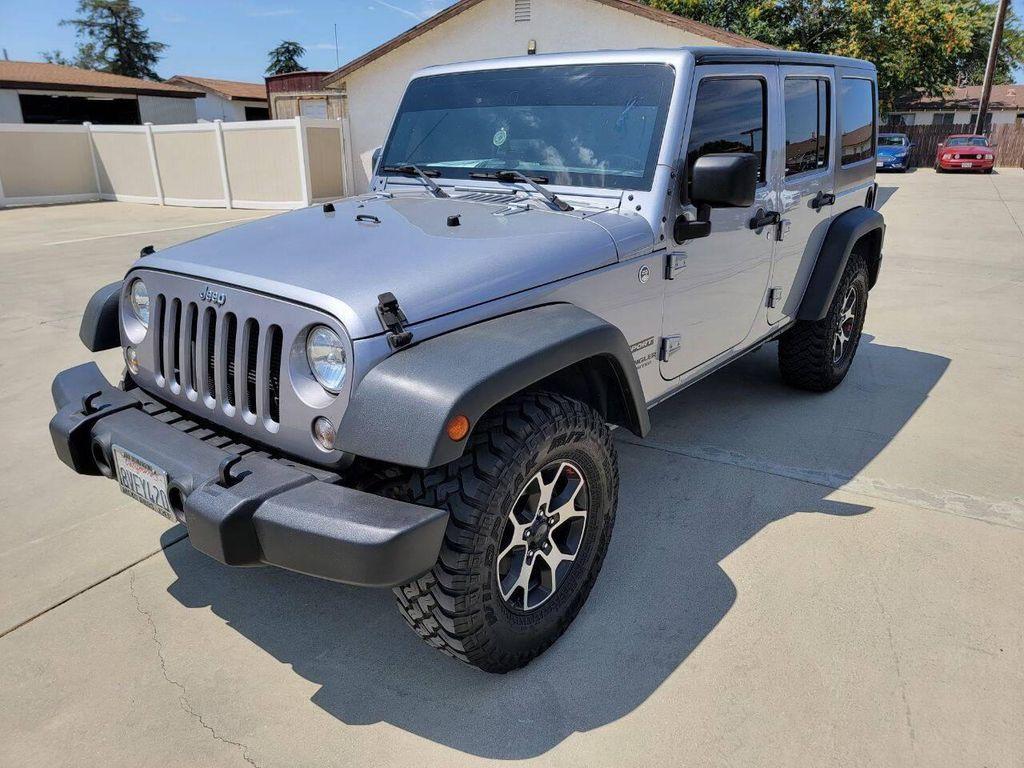 used 2015 Jeep Wrangler Unlimited car, priced at $18,269