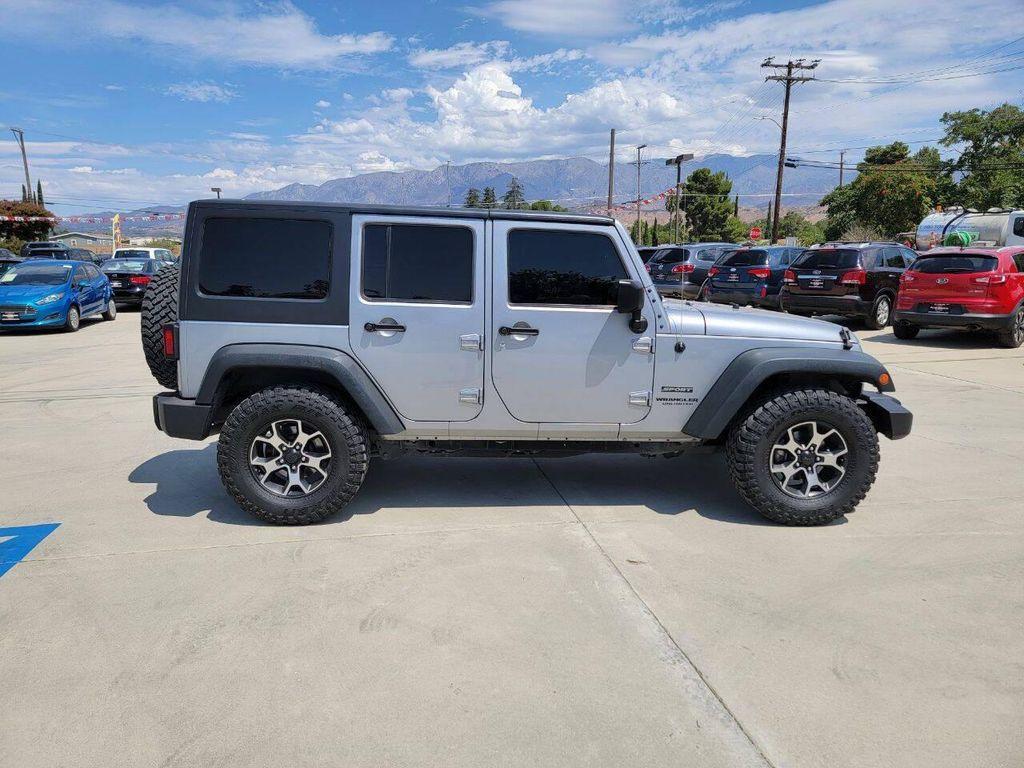 used 2015 Jeep Wrangler Unlimited car, priced at $18,269