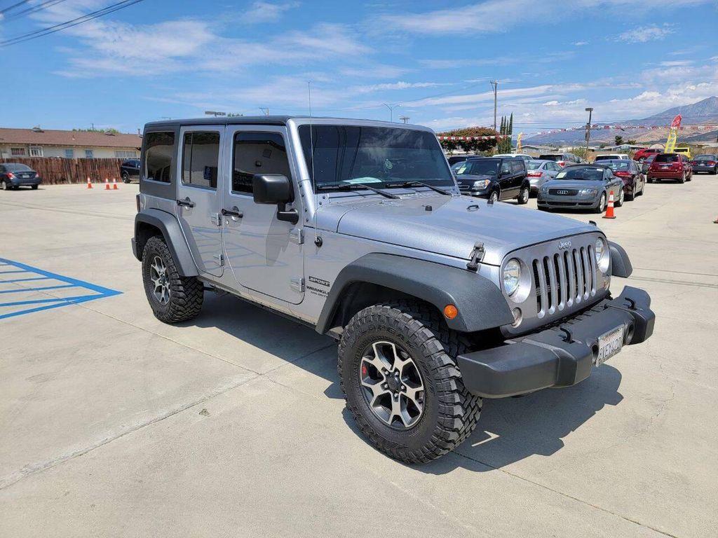 used 2015 Jeep Wrangler Unlimited car, priced at $18,269