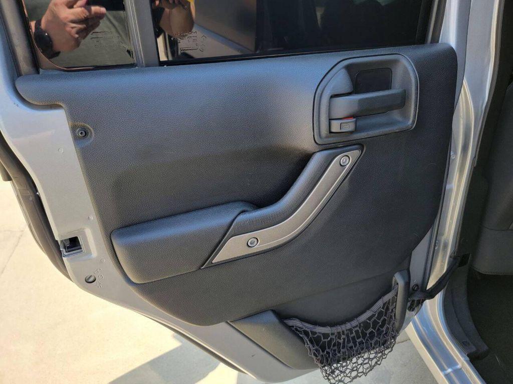 used 2015 Jeep Wrangler Unlimited car, priced at $18,269