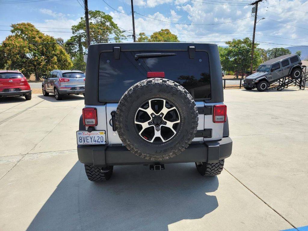 used 2015 Jeep Wrangler Unlimited car, priced at $18,269