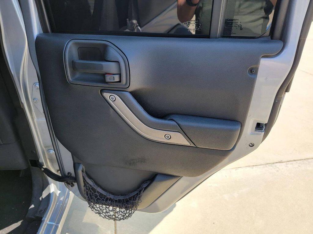 used 2015 Jeep Wrangler Unlimited car, priced at $18,269