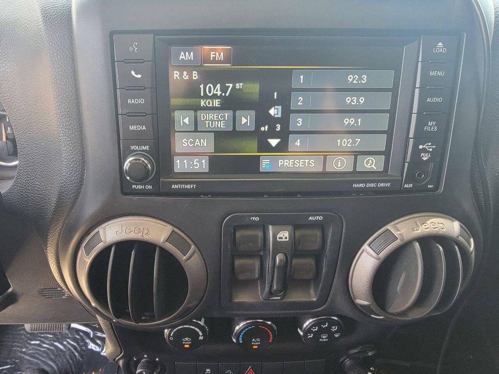 used 2015 Jeep Wrangler Unlimited car, priced at $18,269