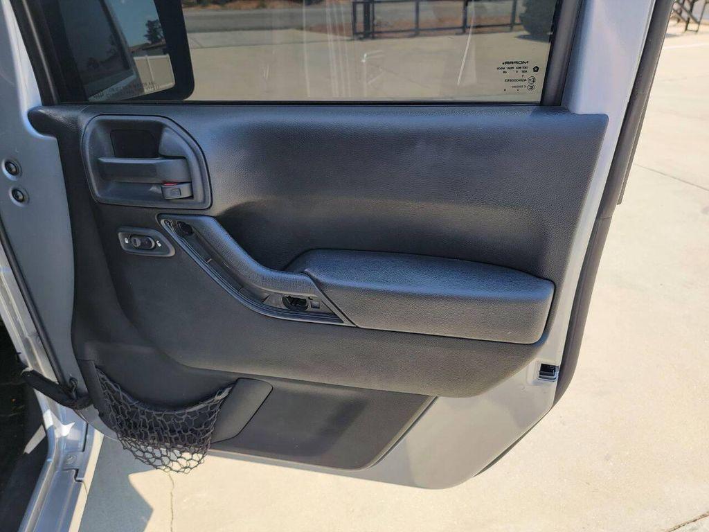 used 2015 Jeep Wrangler Unlimited car, priced at $18,269
