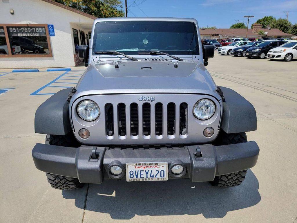 used 2015 Jeep Wrangler Unlimited car, priced at $18,269